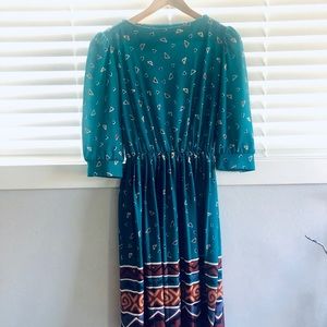 Vintage midi dress with shoulders